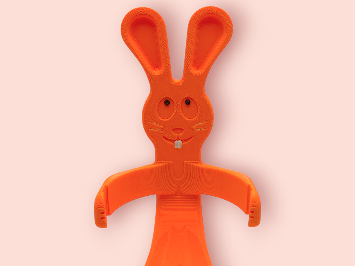 Bunny holding a kinder egg