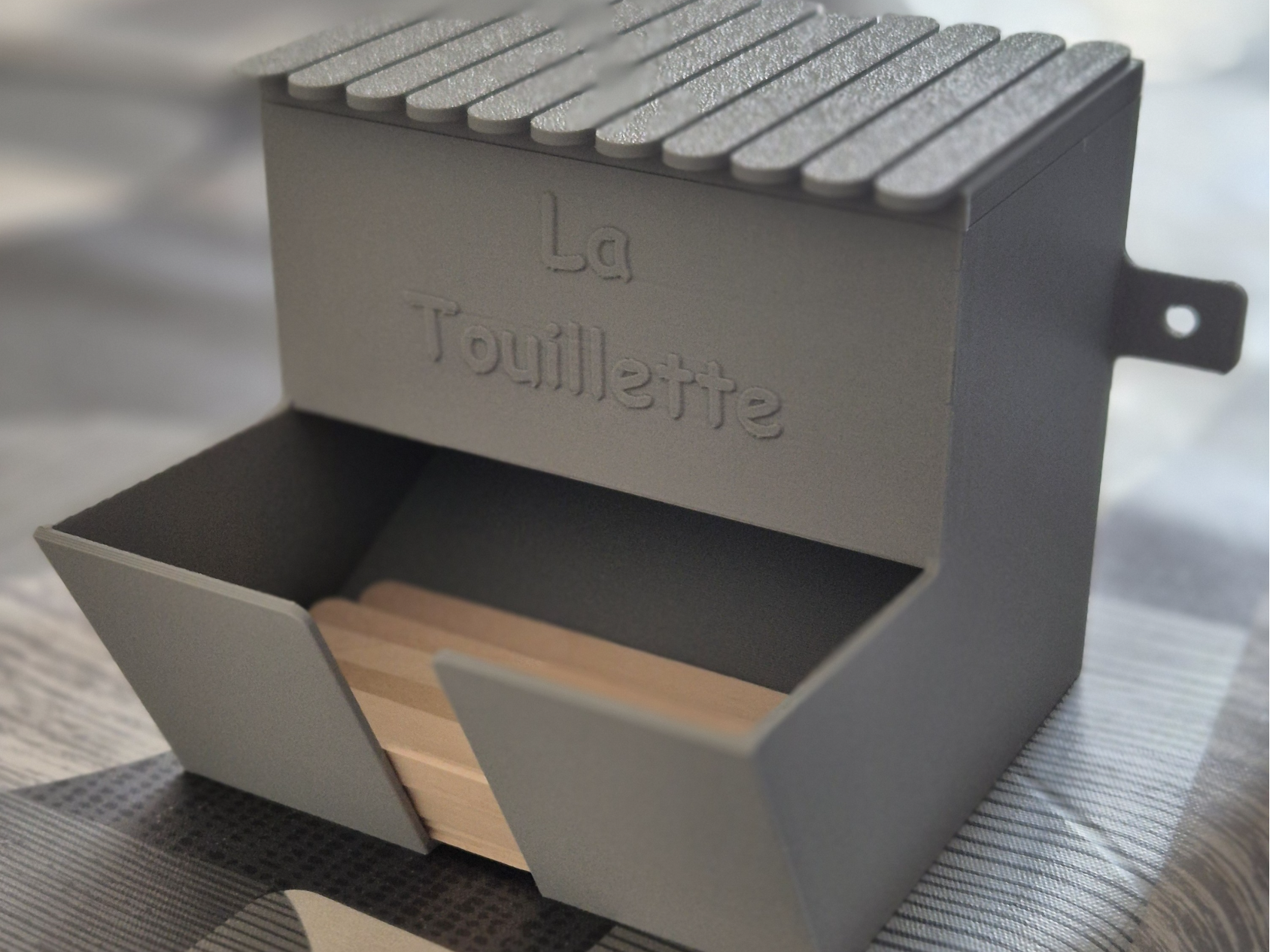 Distributeur à touillette
