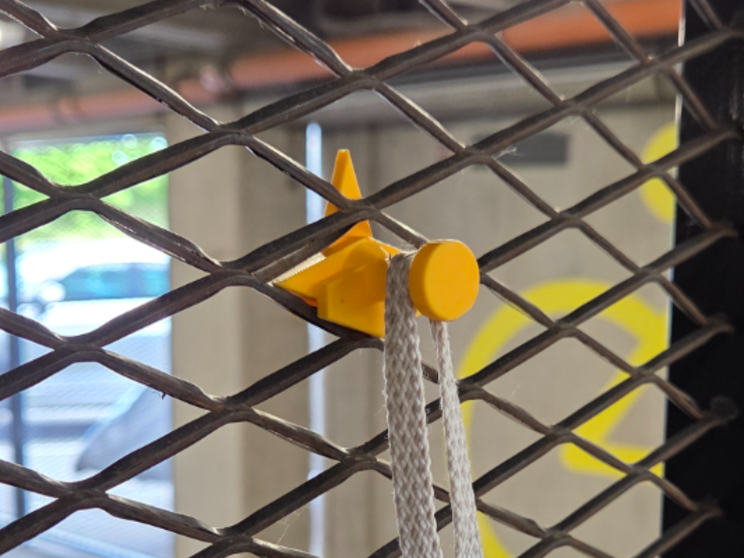 Expanded metal mesh hook