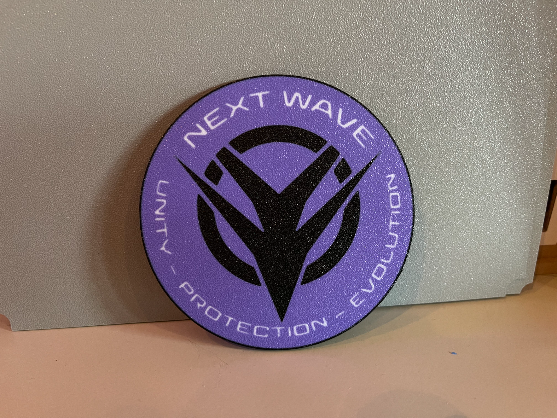 Next wave logo  Sectorial Form Infinty the game