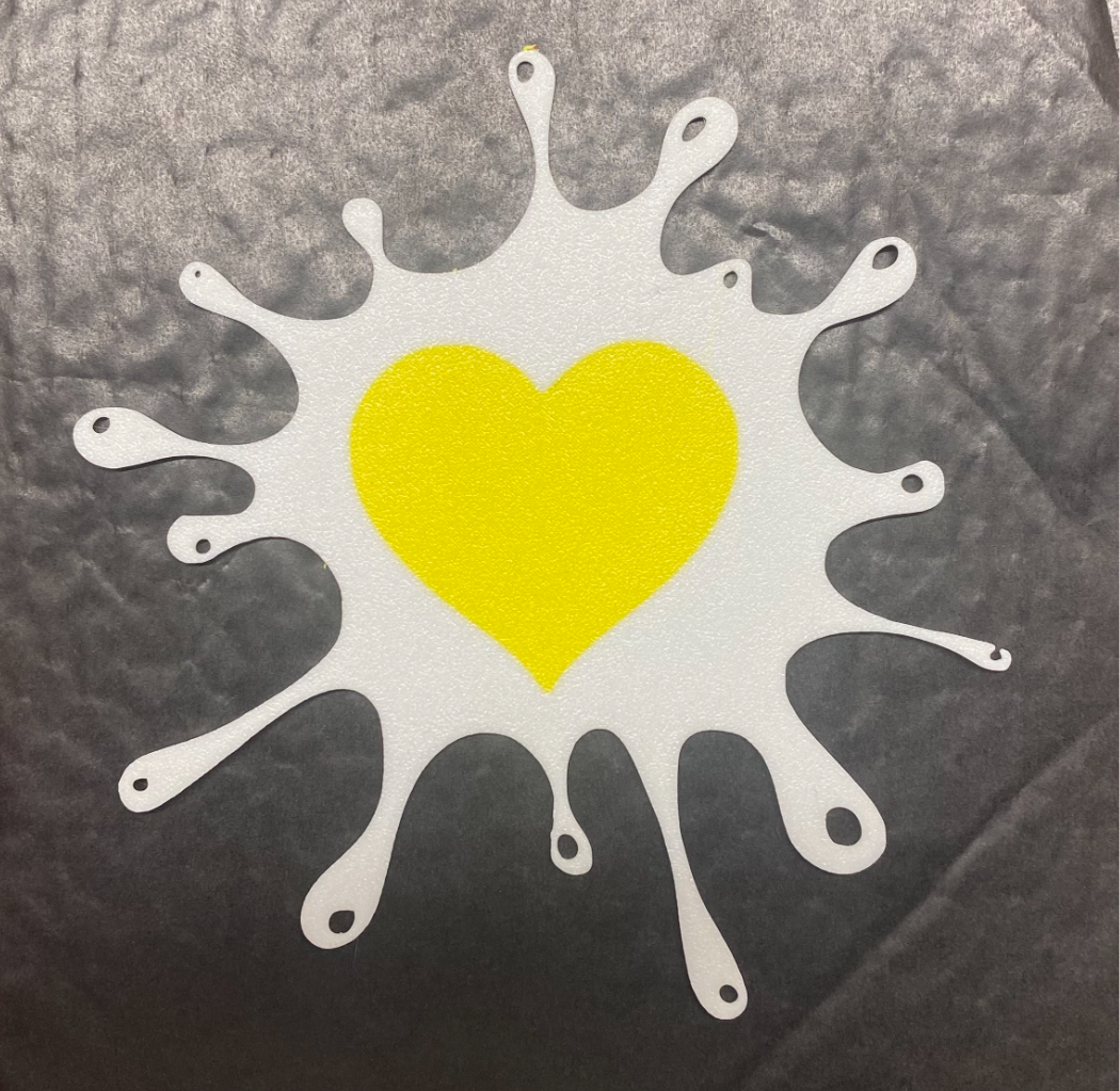 egg with a heart yolk coaster