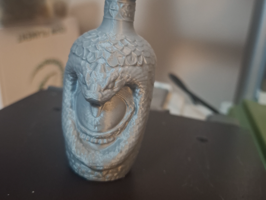 Snake eye potion bottle