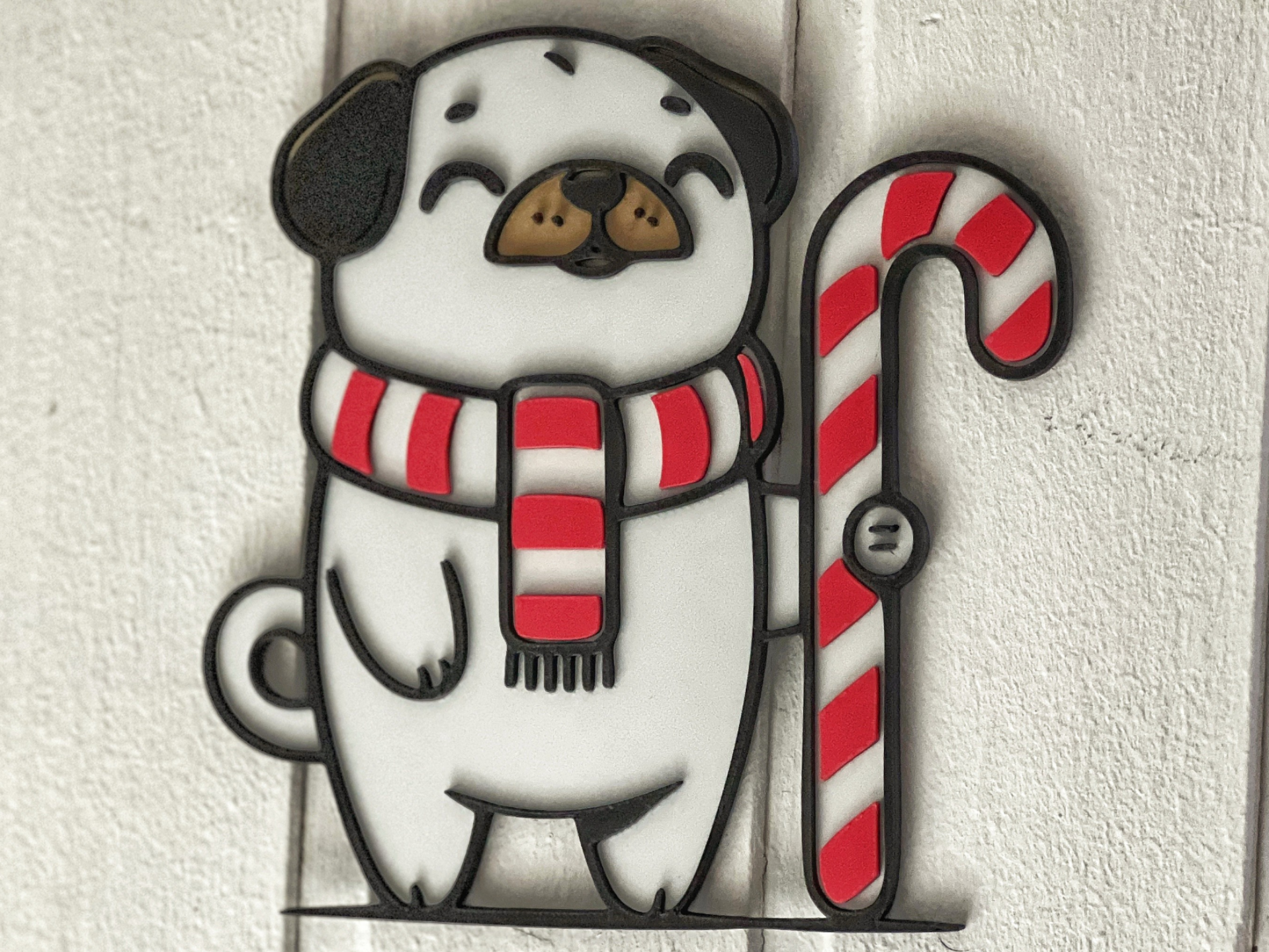 Pug with candycane