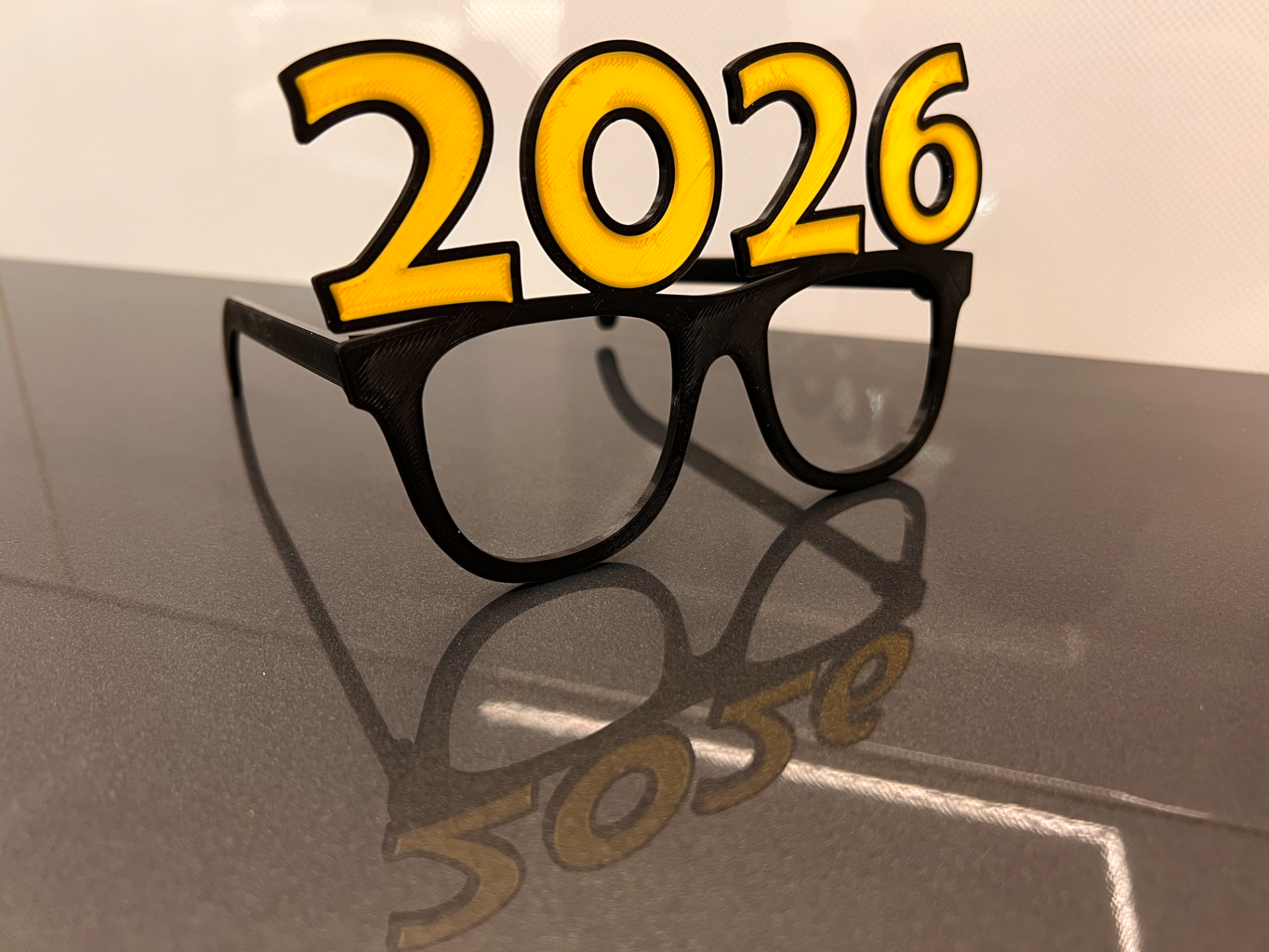 Funny New Year's glasses. Gadget 2026