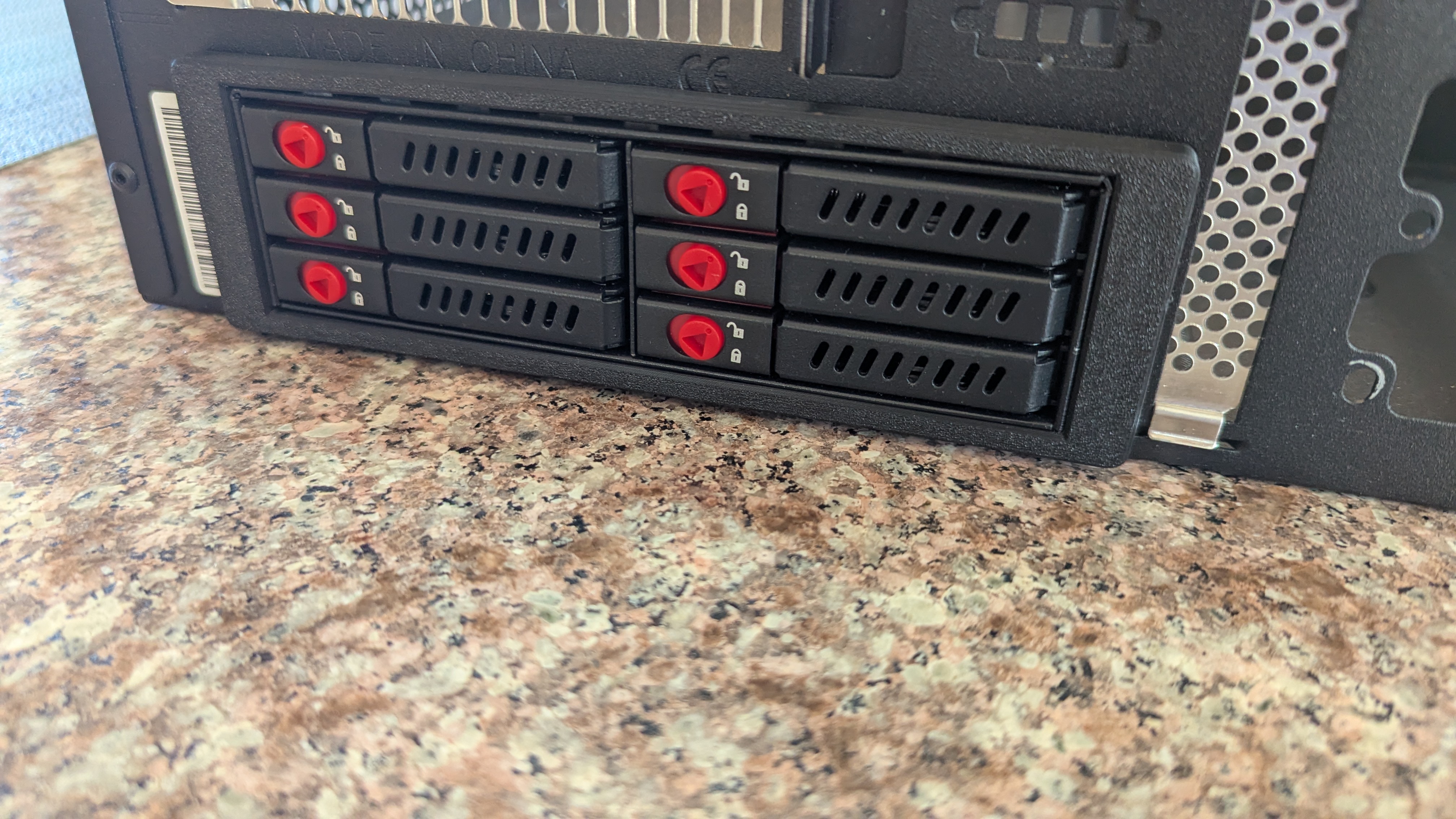 Mounting brackets for Oimaster 6bay 2.5in HDD enclosure into Silverstone Milo ML05 Mini ITX case.