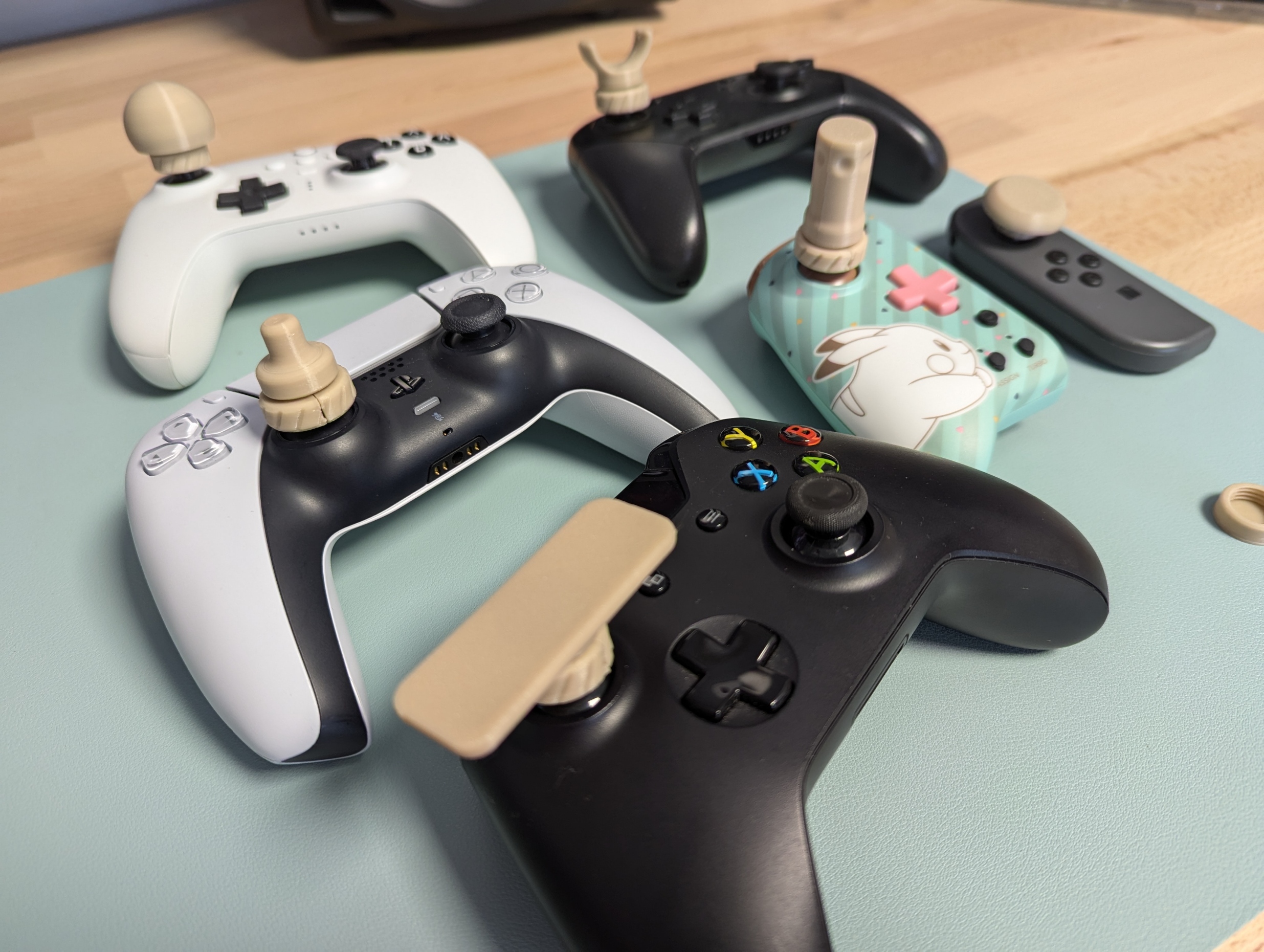 Thumbstick topper system for multiple controllers