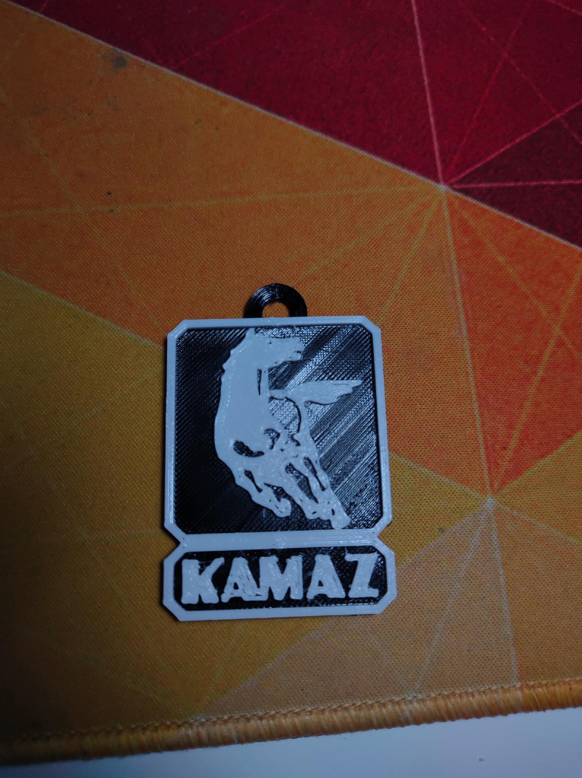 Keychain with the KAMAZ logo
