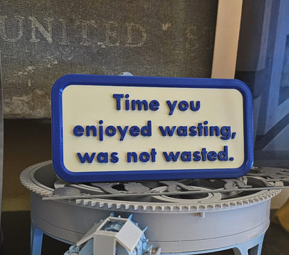 John Lennon quote - "Time you enjoyed wasting, was not wasted" in 3D