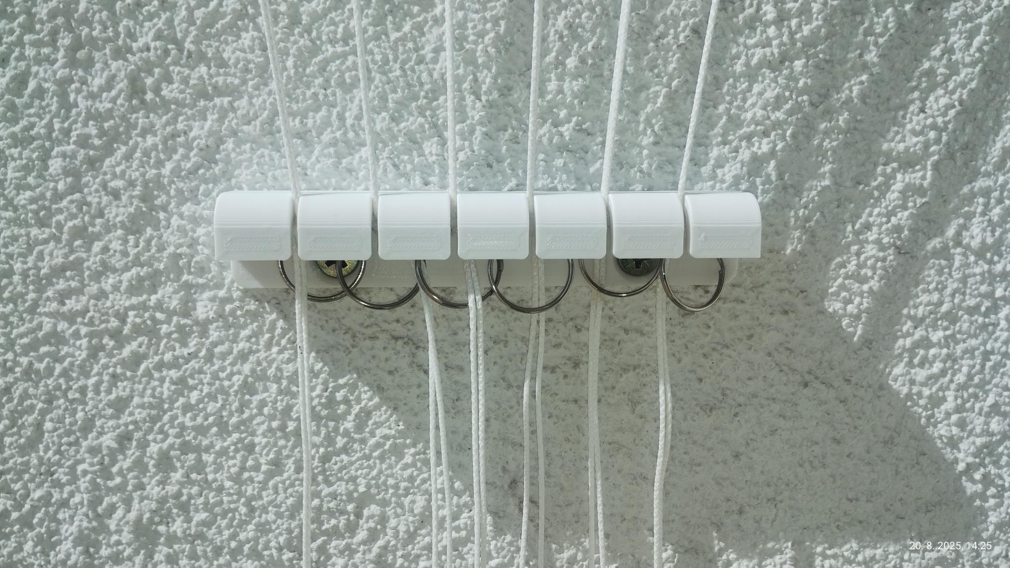 Drziak snury na pradlo na stenu, clothesline holder, diery 90 mm