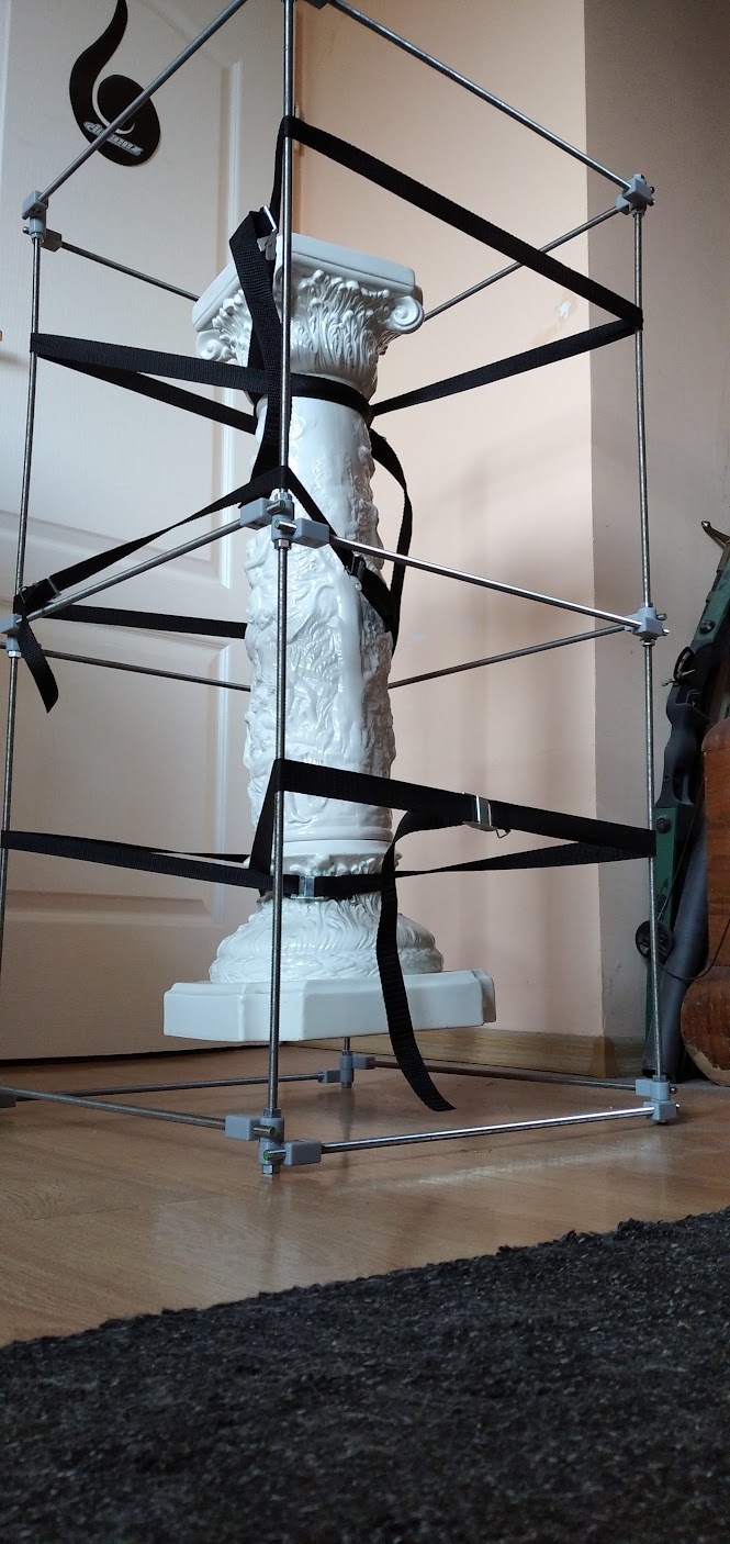 a cage for transporting fragile objects + wheel
