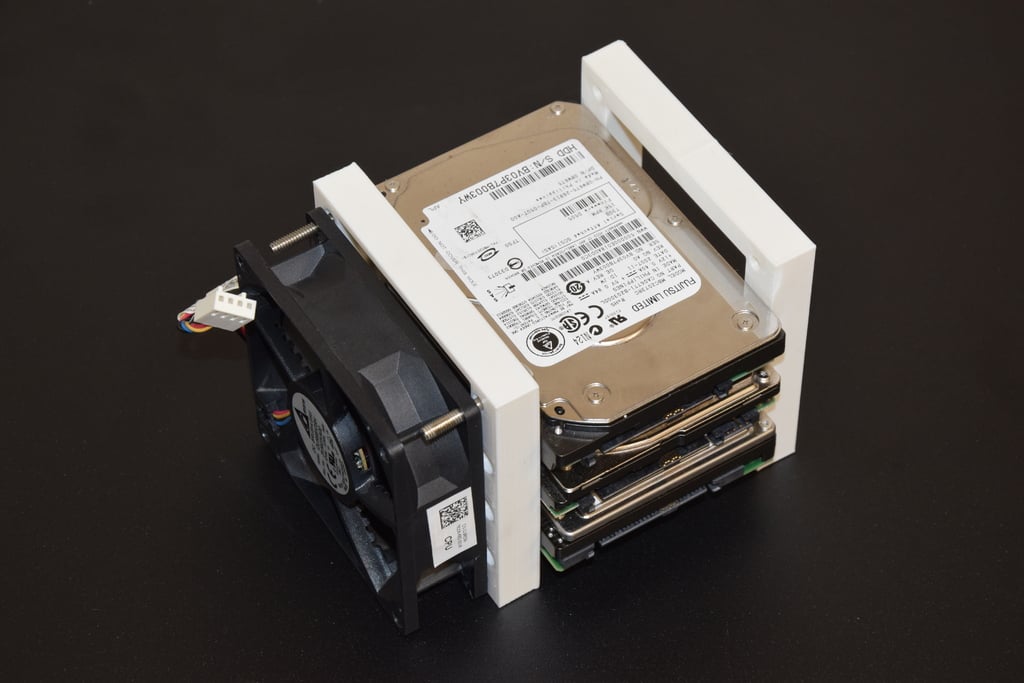 2.5" SSD or hard drive cage with spots for side mounted 80MM fans. Holds up to 3 drives that are 7mm 9.5mm or 15mm. Support for SATA, SAS, U.2