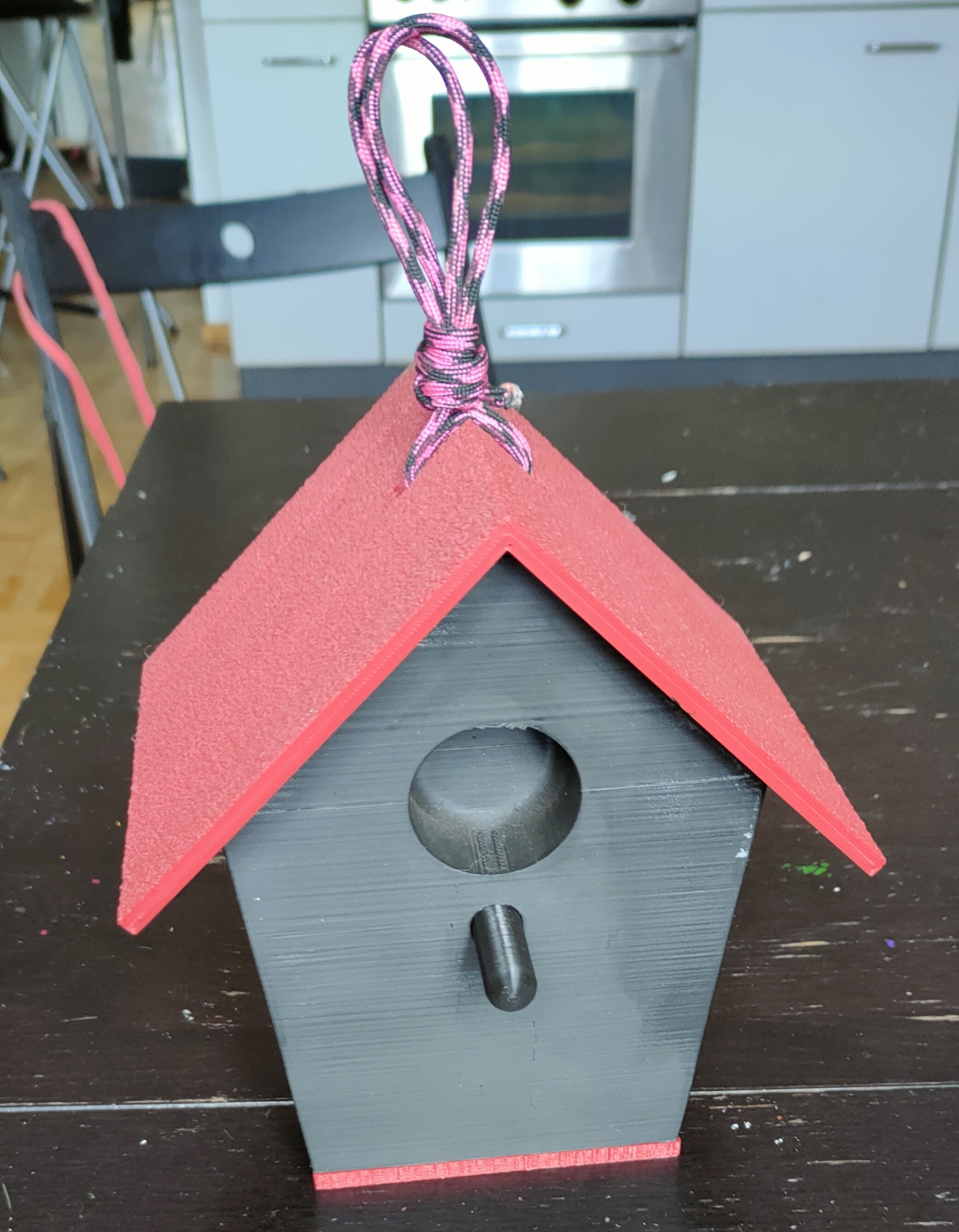 Bird house geocache with puzzle box