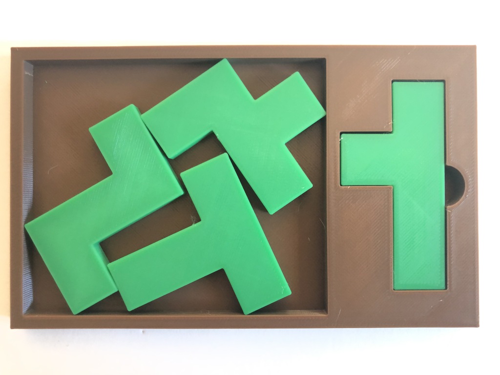 Four Fit - Tray-packing puzzle by Stewart Coffin (STC #217)