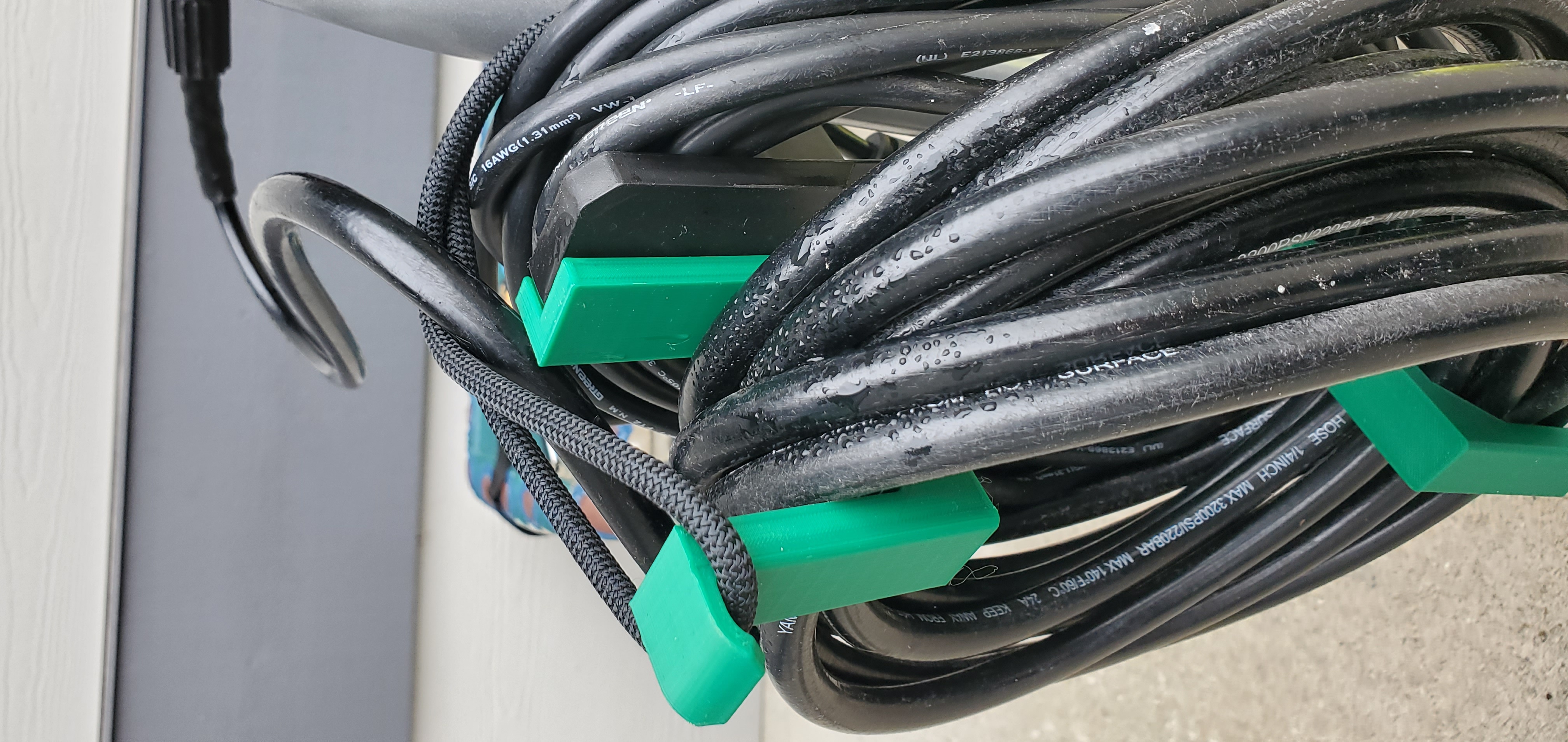 Pressure washer (upper) cord and hose storage