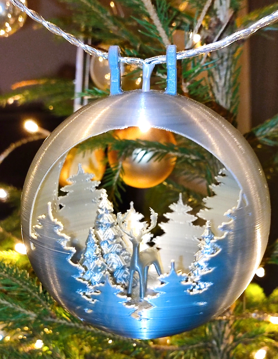 Snowglobe ornament with raindeer, christmas tree, snowman and empty for your design