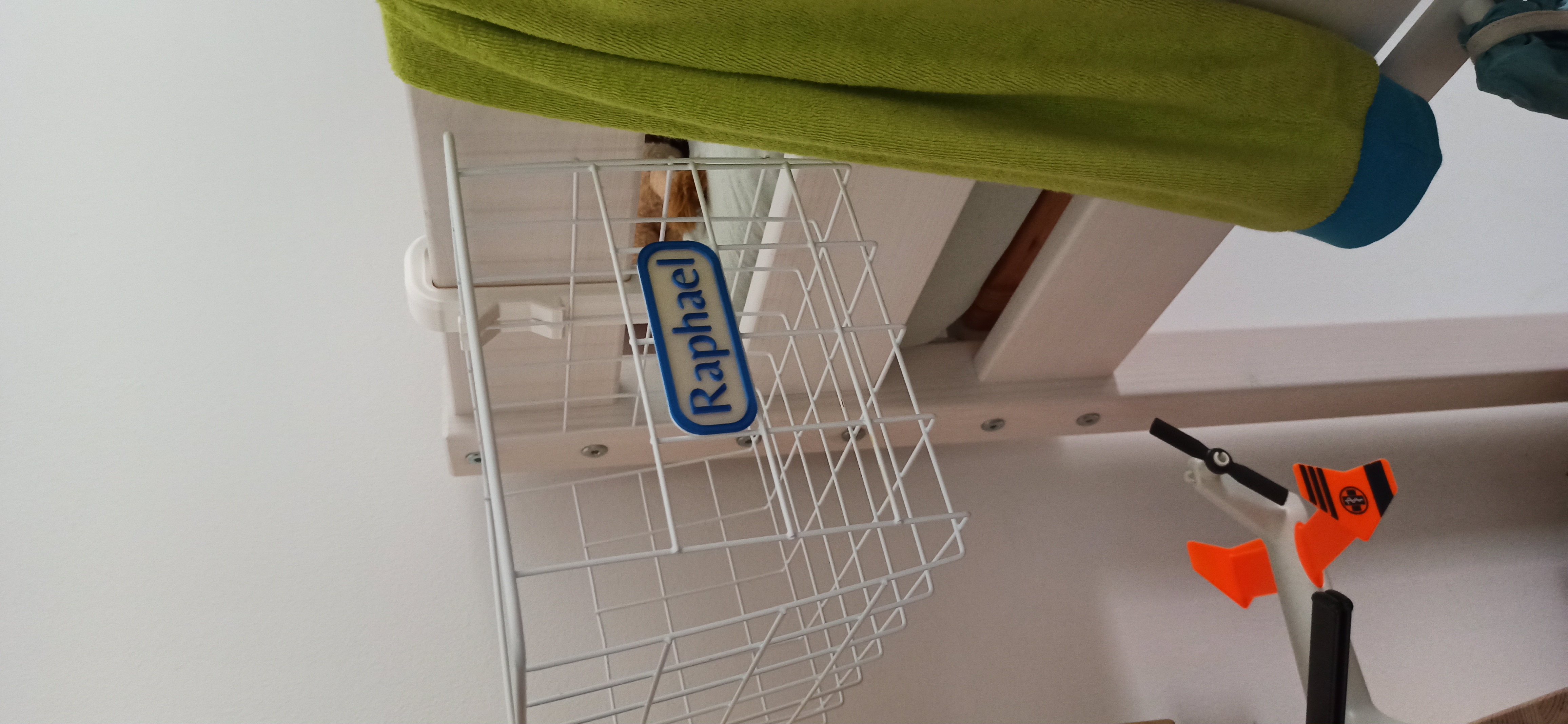 Hook for wire basket with safeguard / universal hook with countersink bores