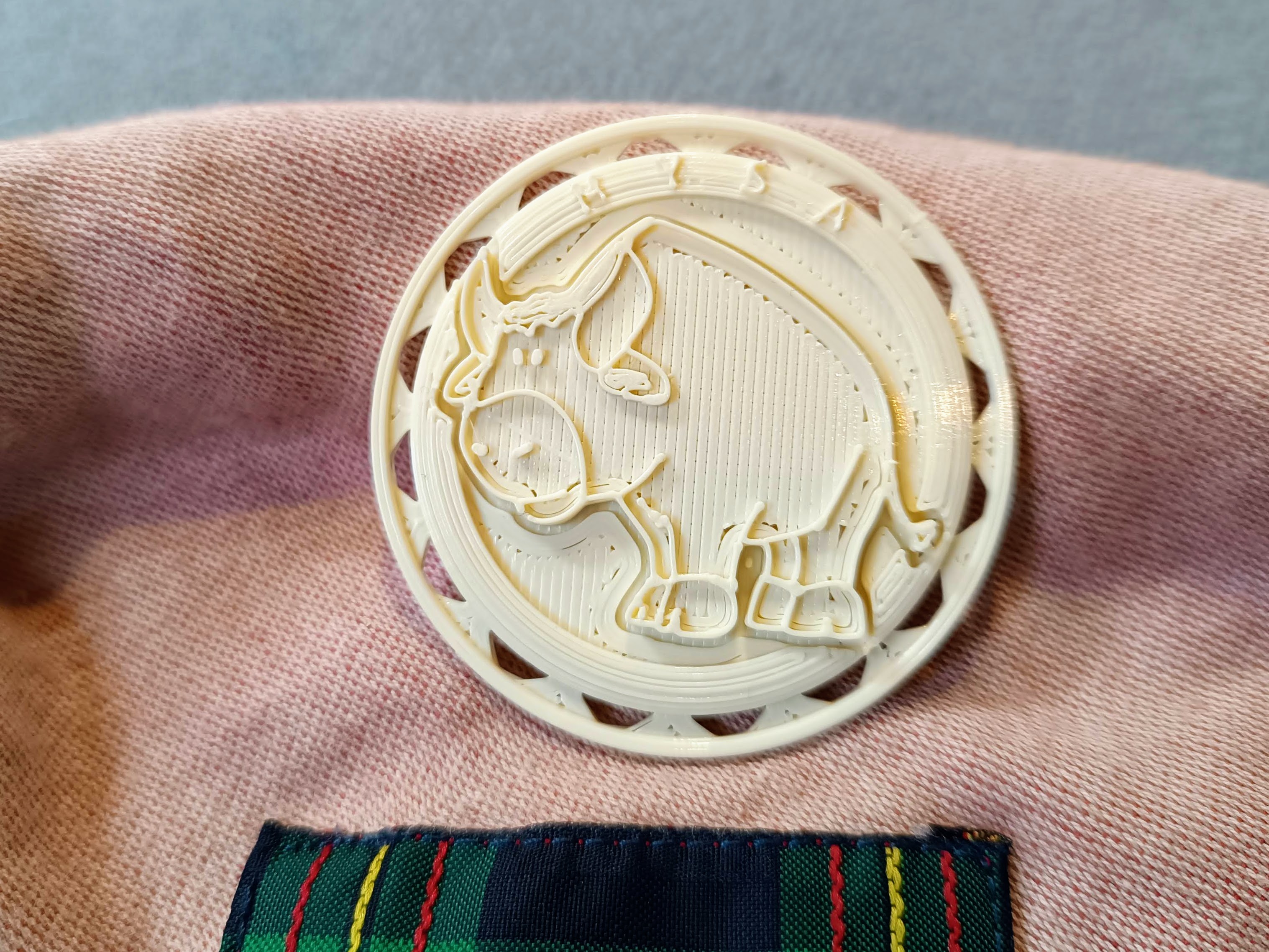 Scout patch badge of Mysa, the Jungle's buffalo, ready to be sewn on