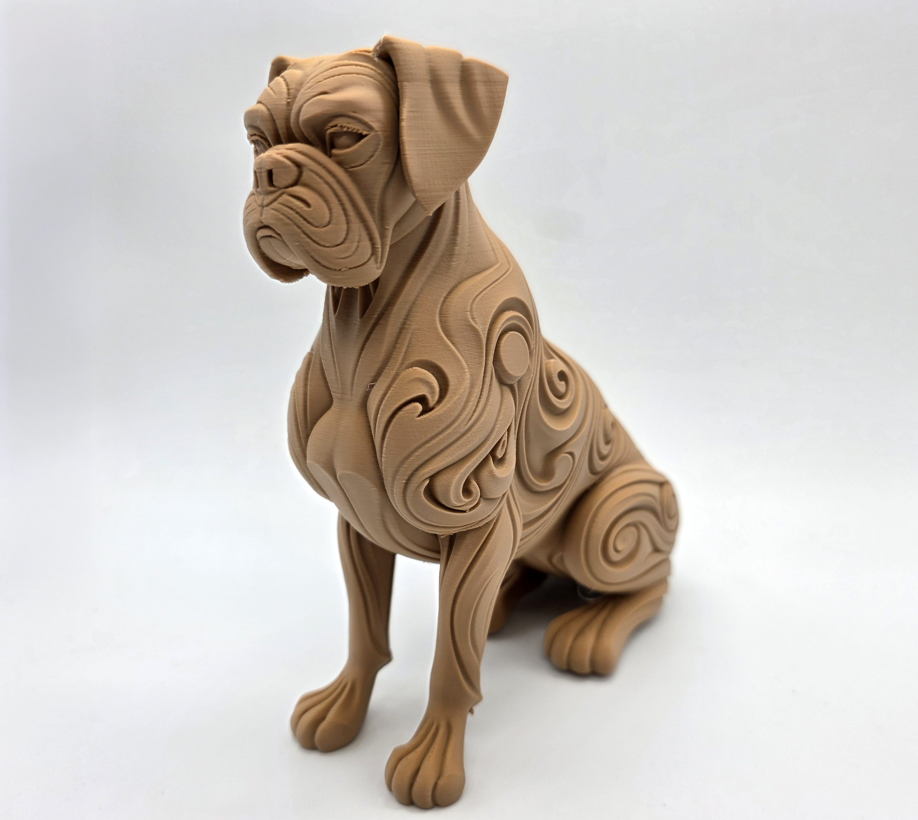 Wood Carved Sitting Boxer with swirls