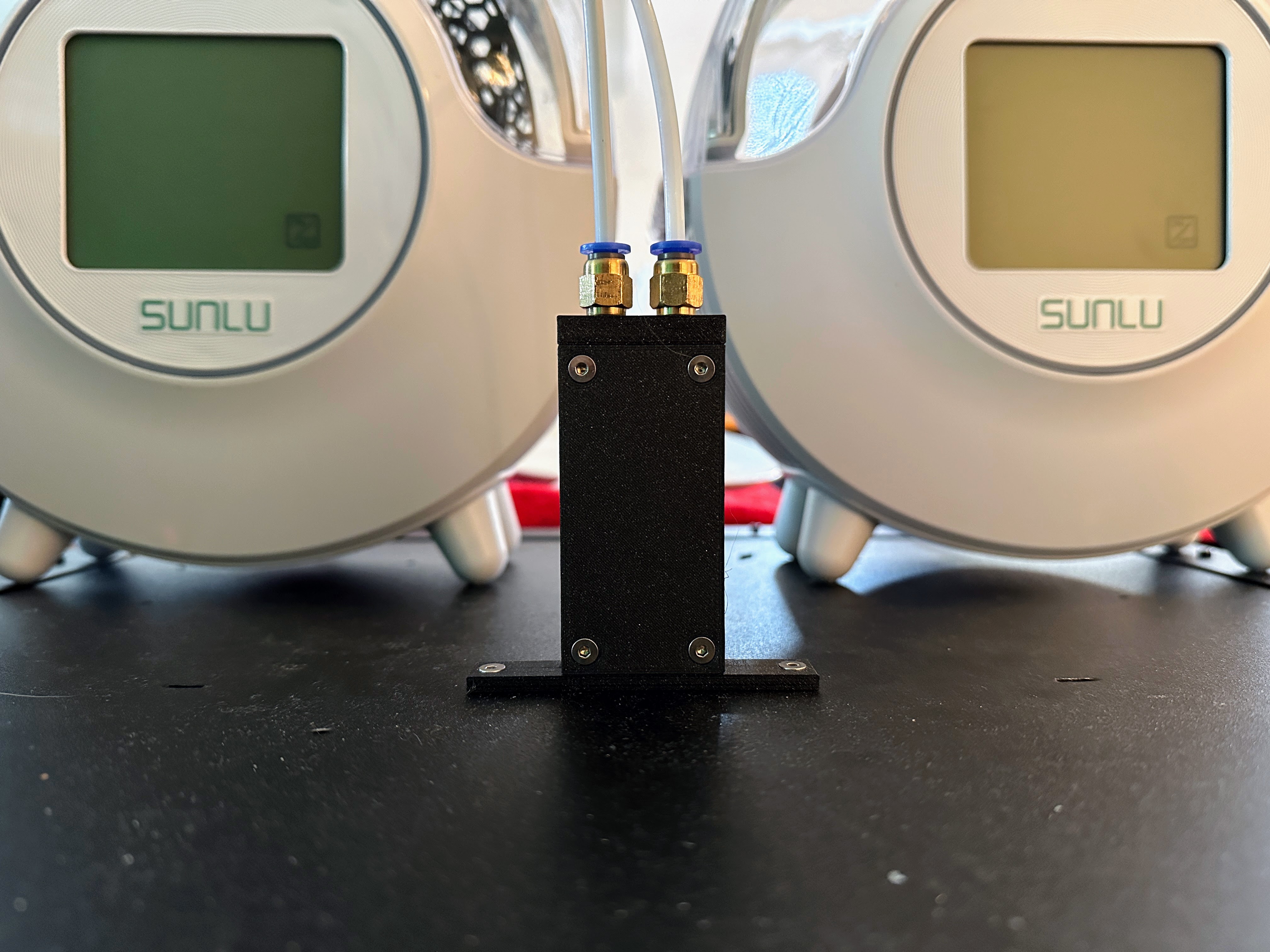 The Thunderdome MK2: Dual Bowden Merger Feed-Through for the Prusa Enclosure (FreeCAD)