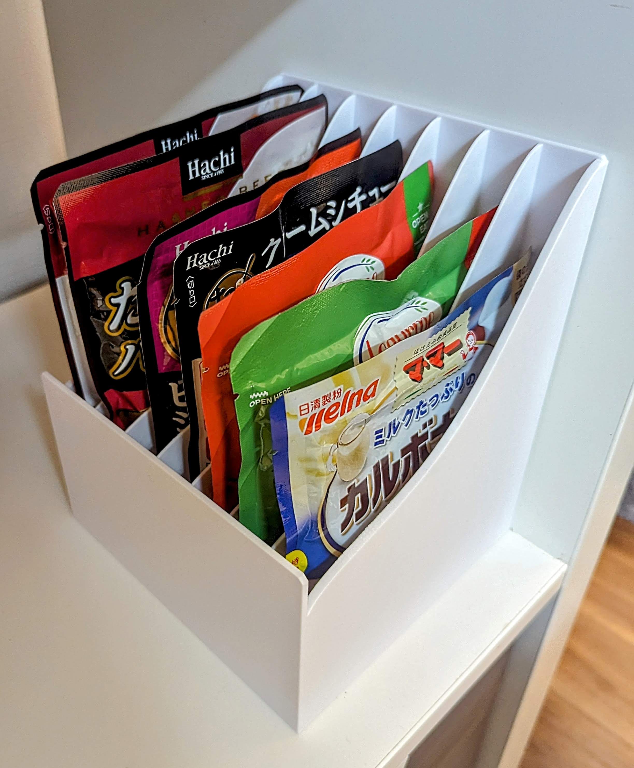 Food pouch organizer (Retort, MRE, cat food, etc). Curved design makes the pouch slide inside easily,