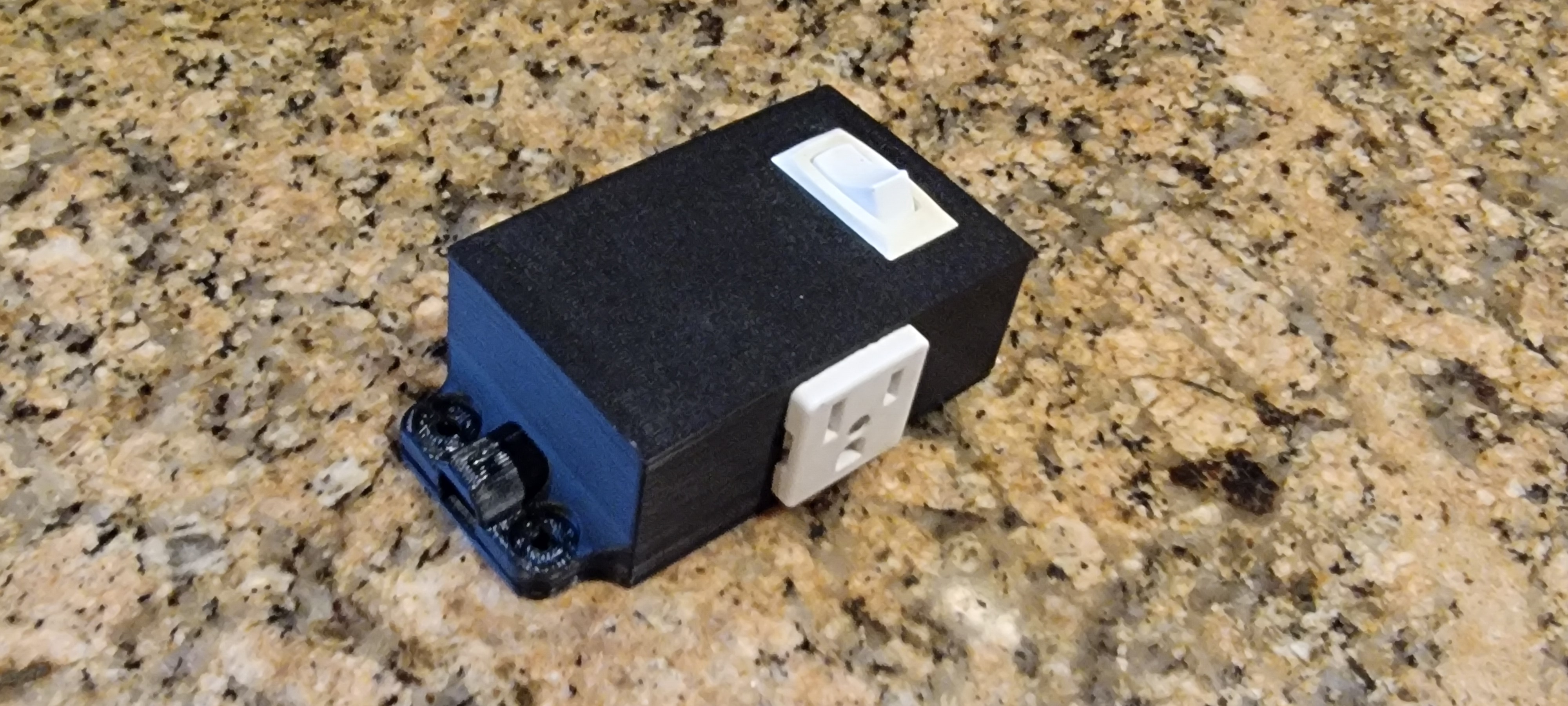Small Junction Box using under-cabinet fluorescent light components for LED light power.