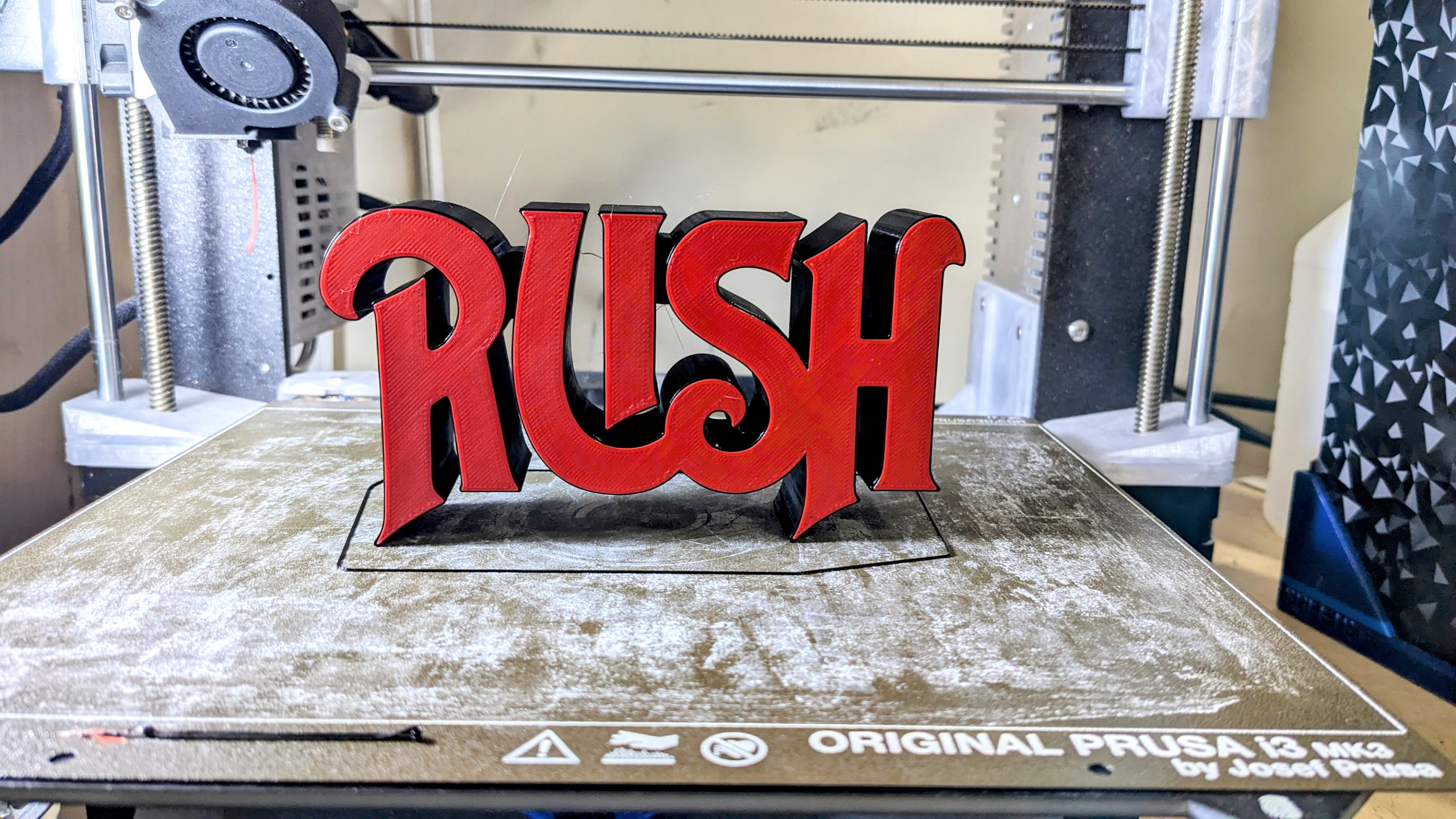 RUSH logo in 3-D
