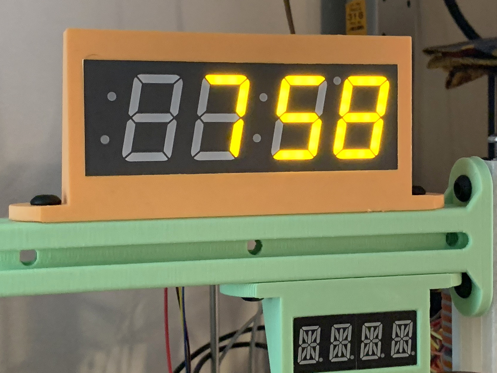 Display holder for an Adafruit 1.2" 4-Digit 14-Segment Display w/I2C Backpack