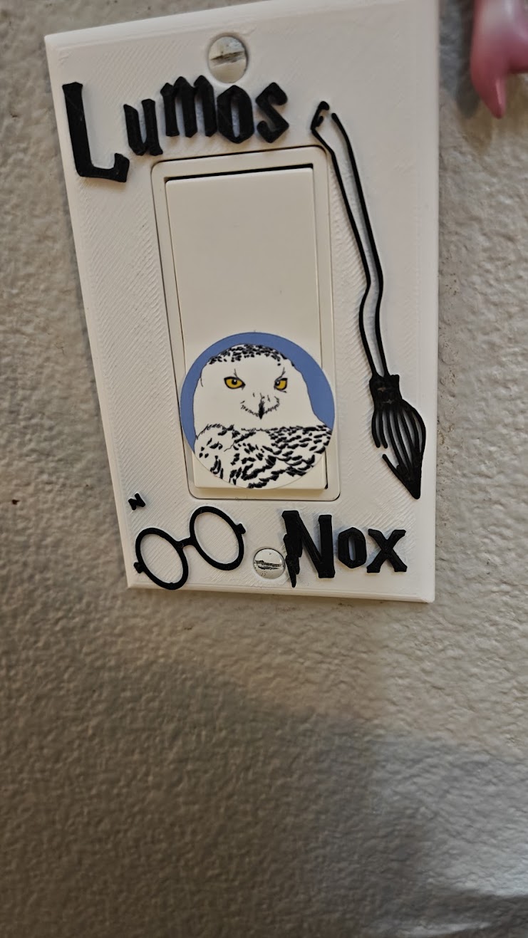 Lumox Nox decora rocker switch plate with harry potter scar and broom