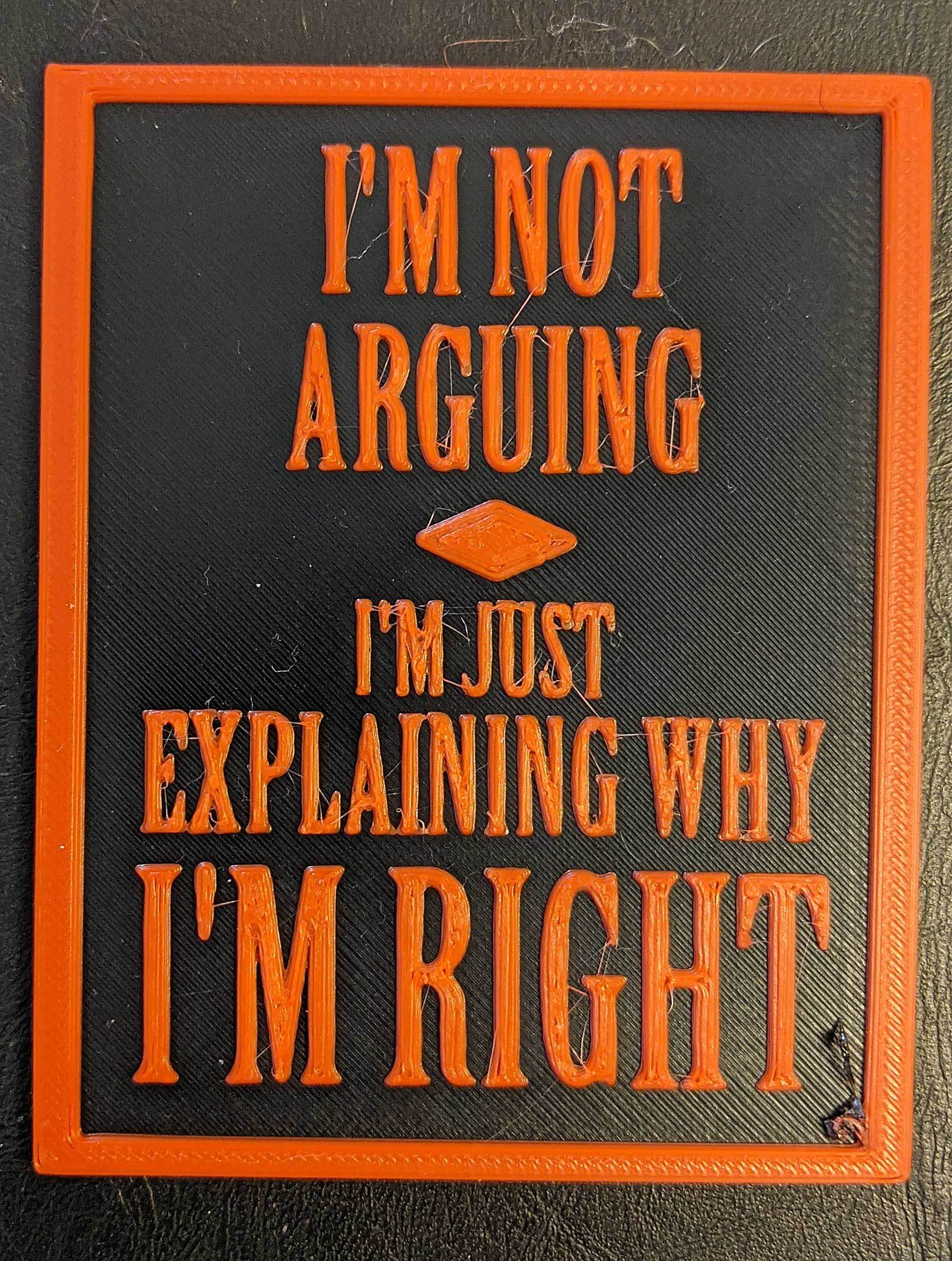 A simple fridge magnet: "I'M NOT ARGUING I'M JUST EXPLAINING WHY I'M RIGHT"