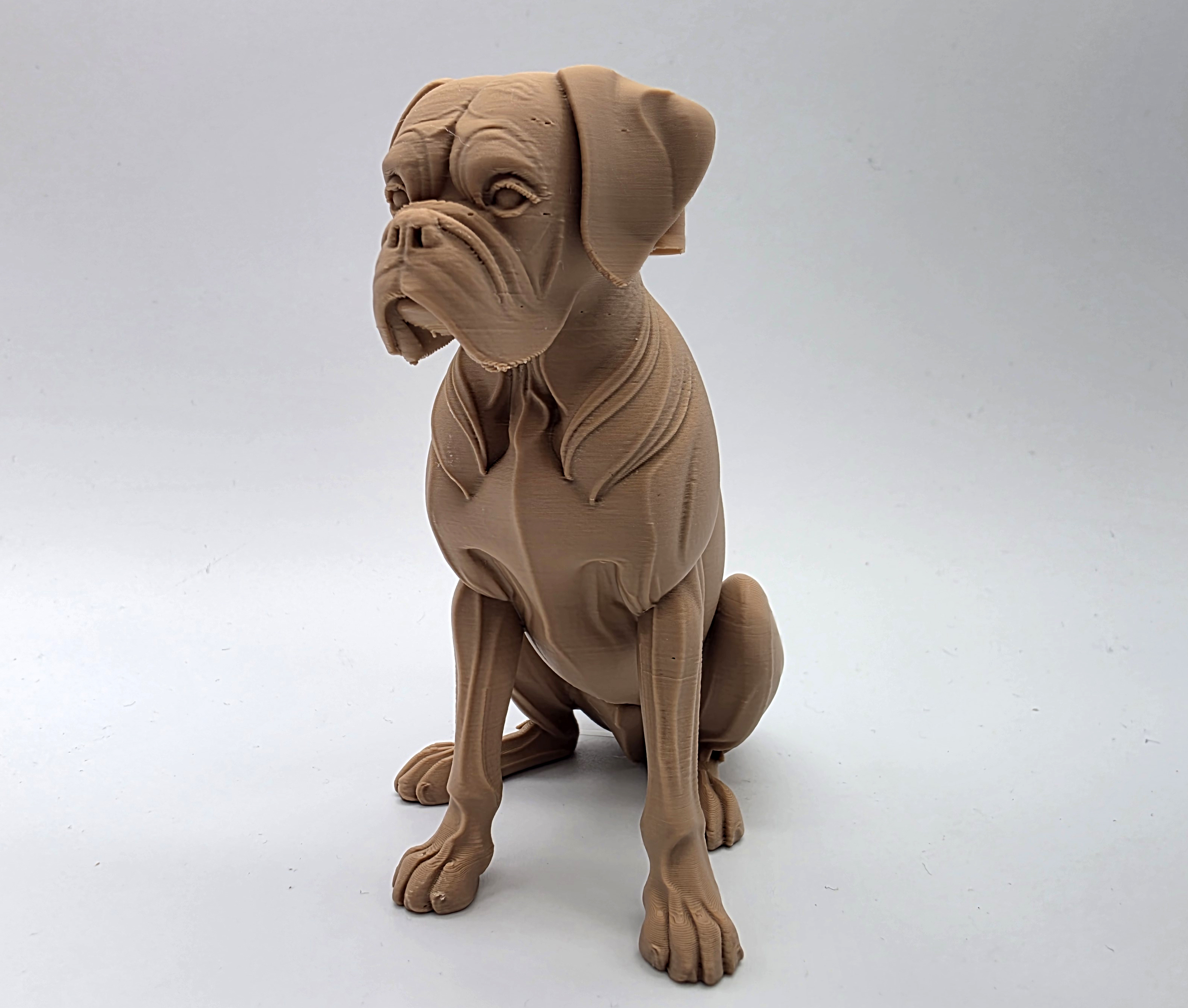 Carved Seated Boxer Dog Sculpture