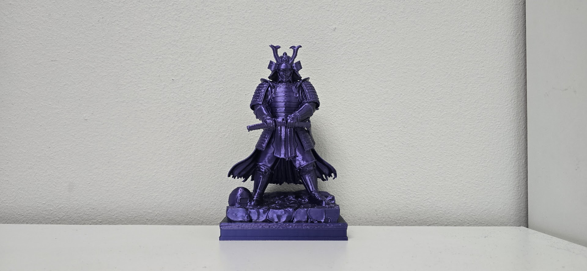 Purple Silk Samurai Warrior on Rock