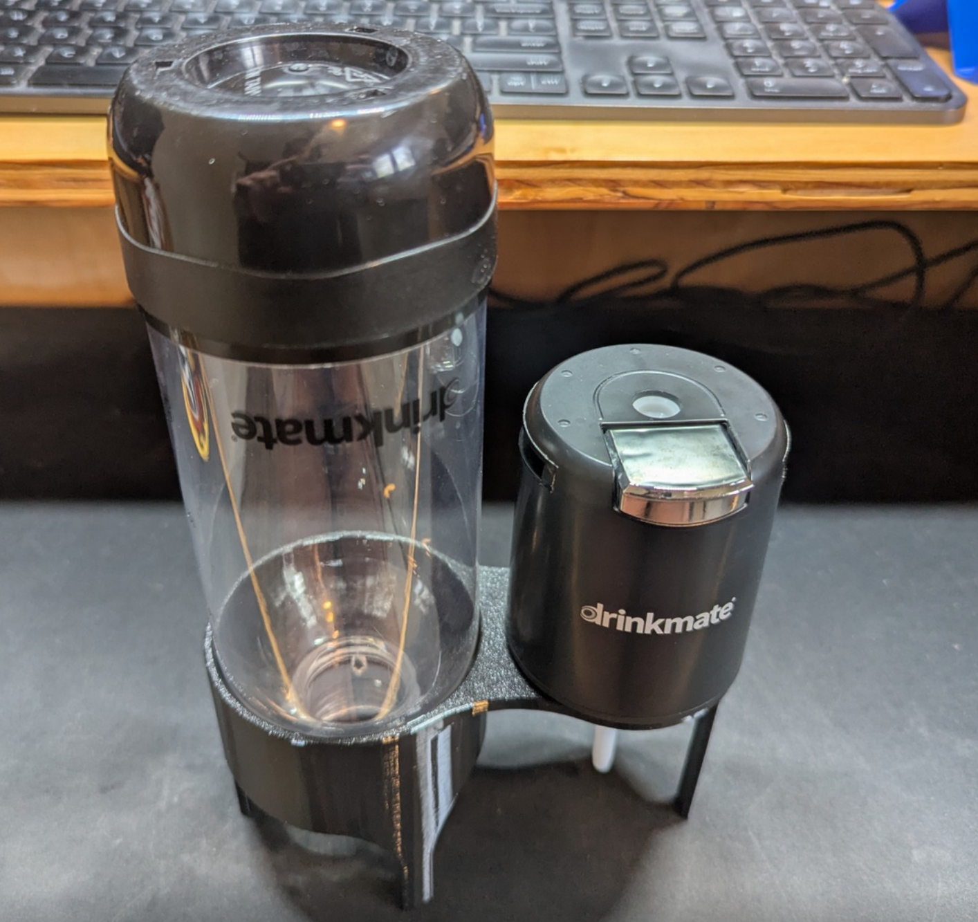 Two Drinkmate 0.5L Bottle and Fizz Infuser Cap Stands