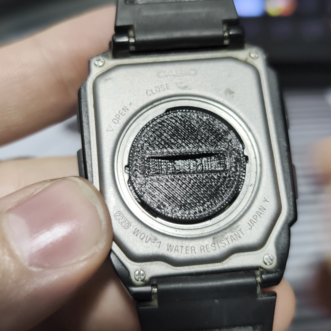 Casio WQV-1 camera watch battery cover